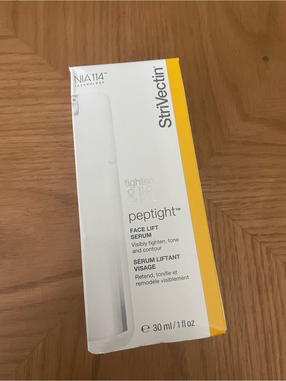 StriVectin Peptight Face Lift Serum - White with Yellow Accent